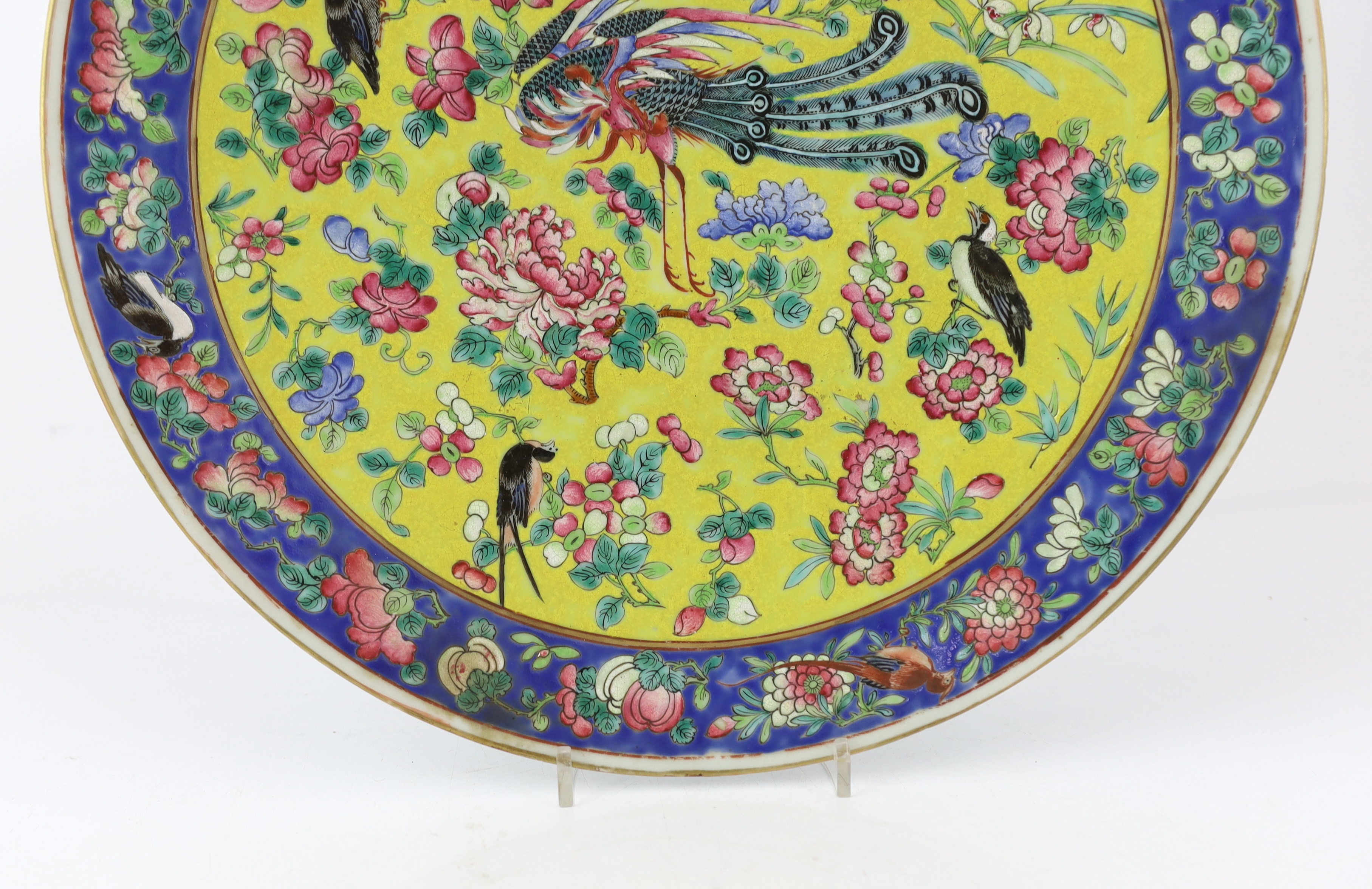 A Chinese yellow ground famille rose dish, late 19th century, with unusual Western script ‘F.L’ seal mark